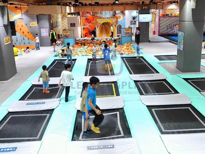 Well Designed Indoor Trampoline Park with Kids Rainbow Climbing Net for Sale